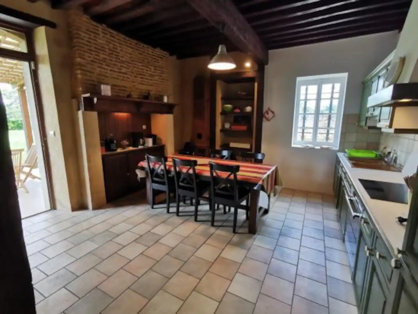Kitchen which opens onto the patio and garden.
